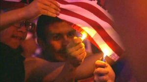 Mexicans burn Trump banner